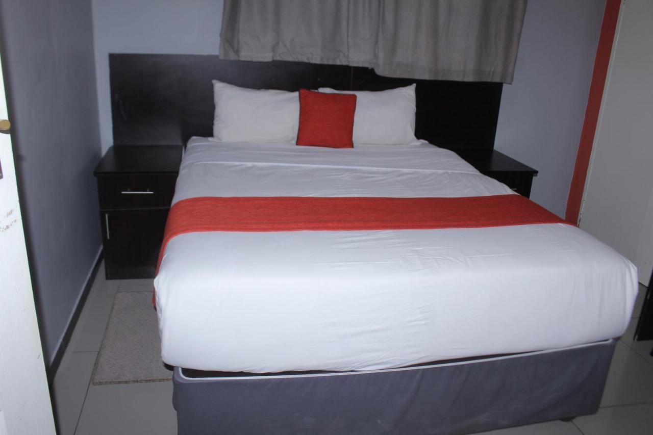 Global Guest House 卡萨内 外观 照片