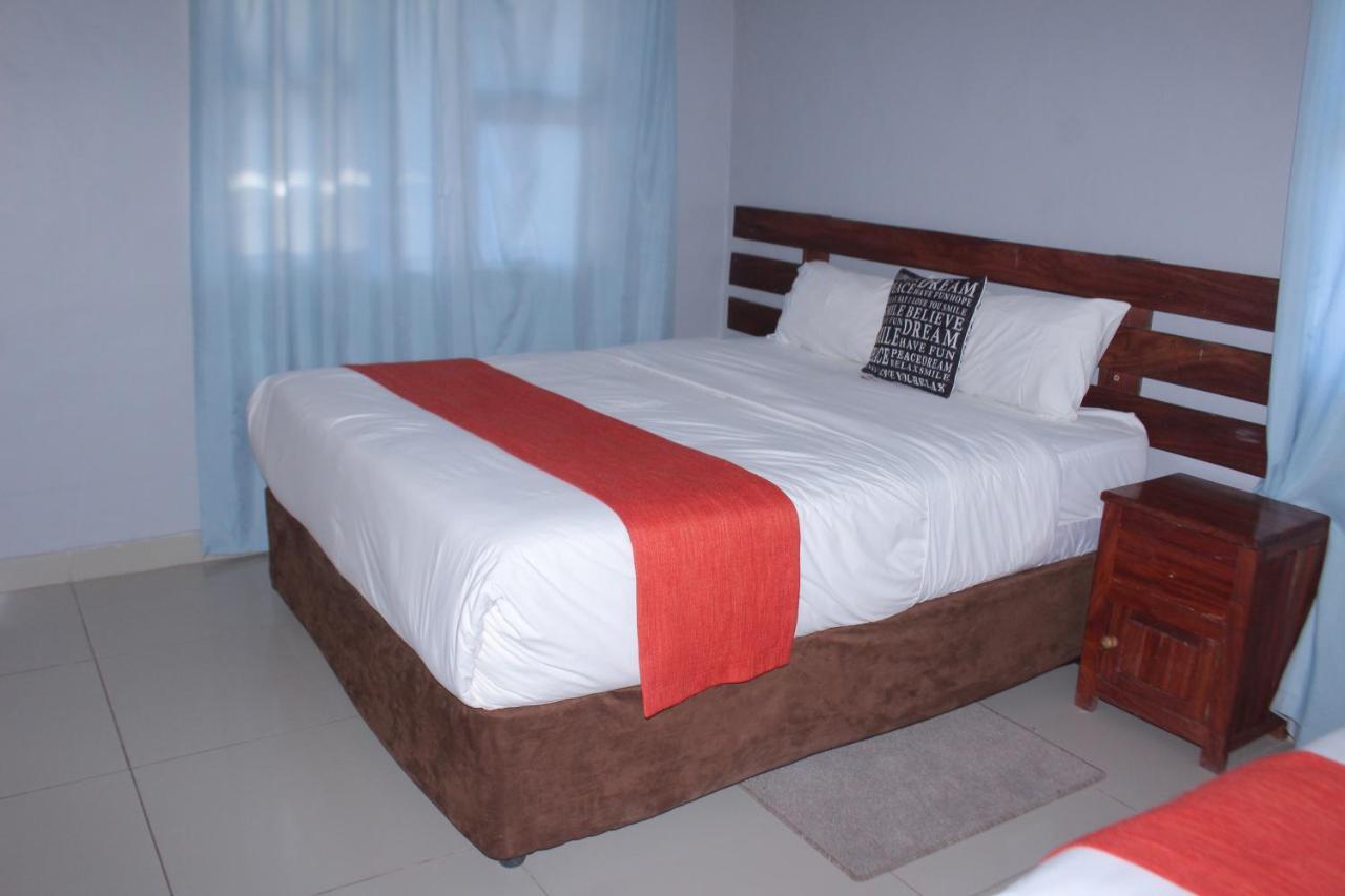 Global Guest House 卡萨内 外观 照片