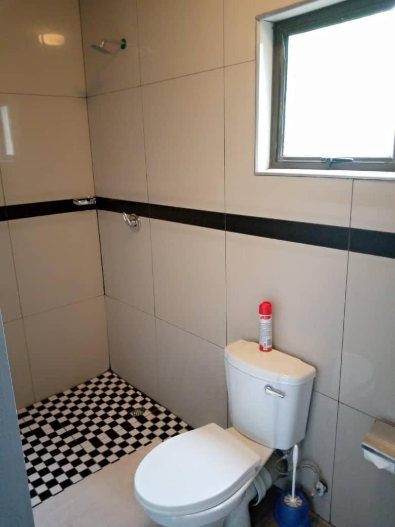Global Guest House 卡萨内 外观 照片